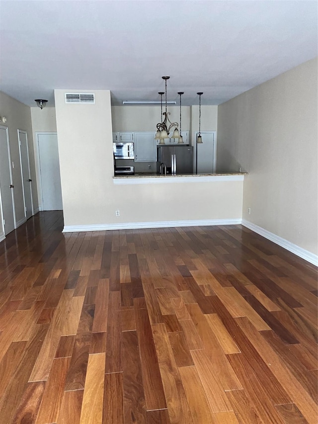 interior space with dark hardwood / wood-style floors