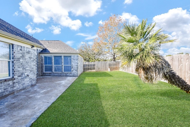 view of yard with a patio area