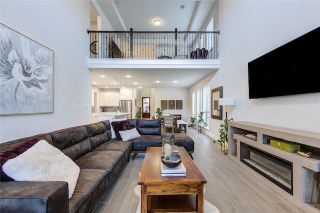 living room with a high ceiling