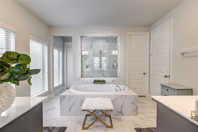 bathroom with vanity and plus walk in shower