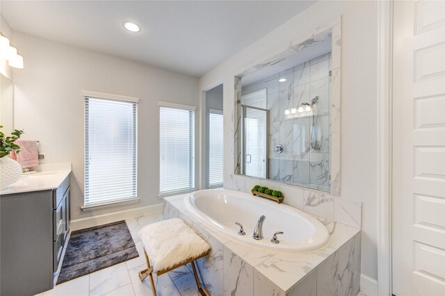 bathroom with vanity and plus walk in shower