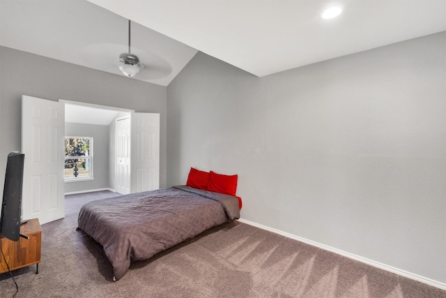 bedroom with carpet, ceiling fan, and lofted ceiling