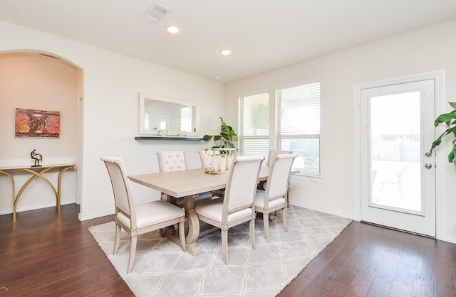 dining area with hardwood / wood-style flooring