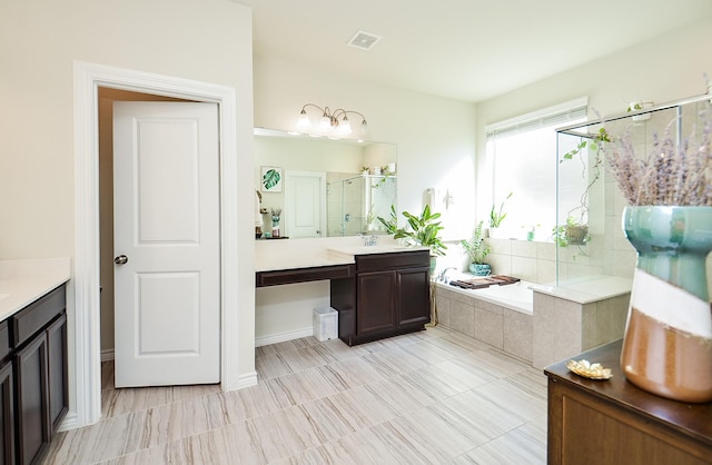 bathroom featuring plus walk in shower and vanity