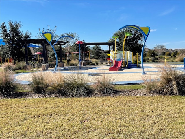 view of play area featuring a lawn