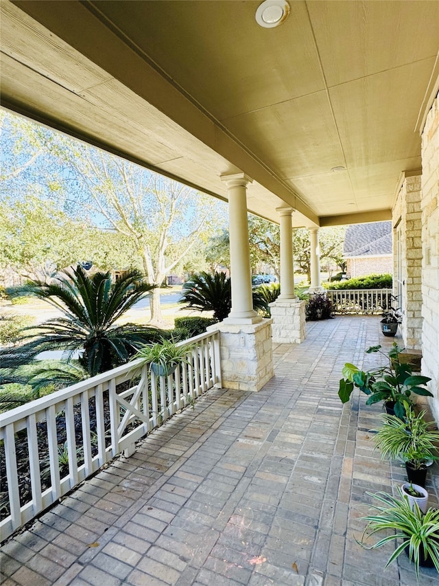 view of patio featuring a porch