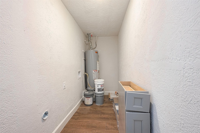 utility room with gas water heater