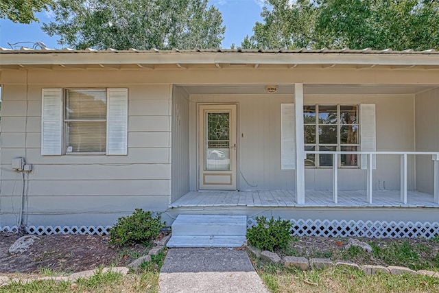 property entrance with a porch