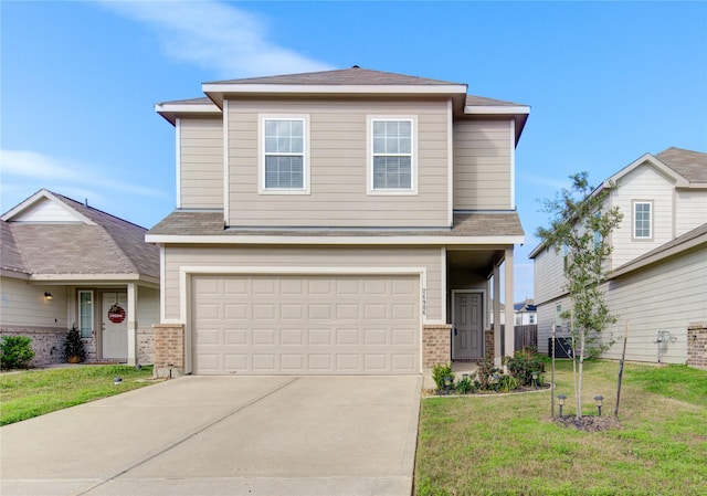 front of property with a garage and a front yard