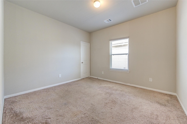 view of carpeted spare room