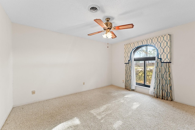 unfurnished room with ceiling fan