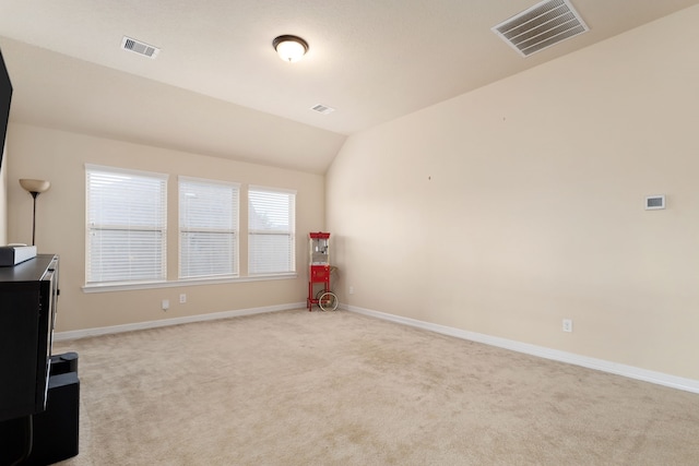 interior space featuring vaulted ceiling