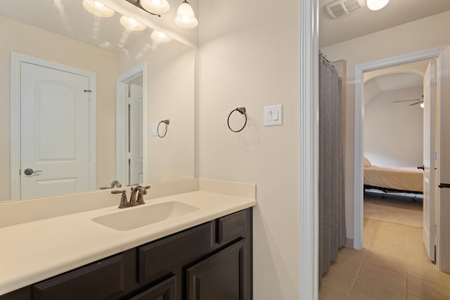 bathroom with vanity, tile patterned floors, and ceiling fan