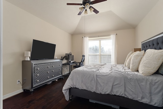 bedroom with lofted ceiling, ceiling fan, and dark hardwood / wood-style floors