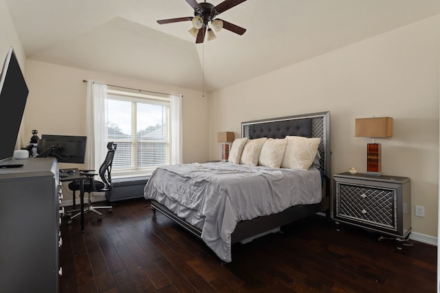 bedroom with ceiling fan, dark hardwood / wood-style flooring, and vaulted ceiling