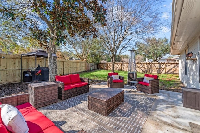 view of patio / terrace with an outdoor living space and area for grilling