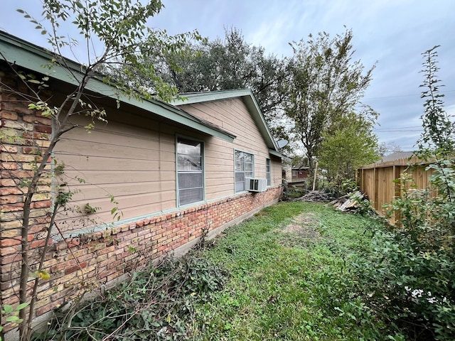 view of home's exterior featuring cooling unit