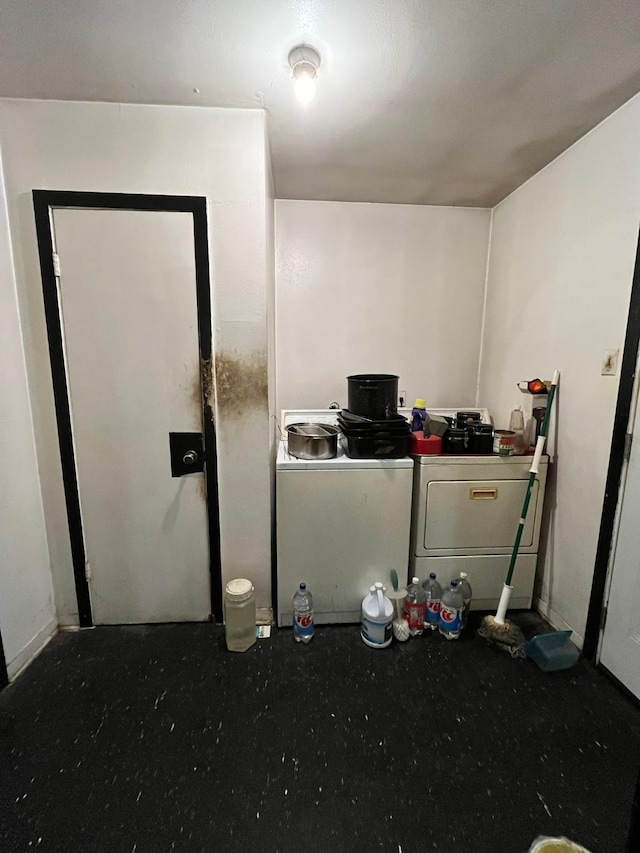 interior space with washer / clothes dryer and concrete flooring