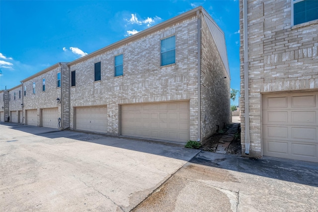 exterior space with a garage