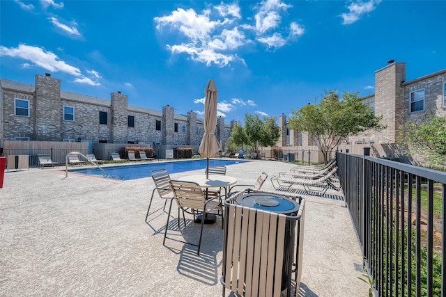 view of pool with a patio