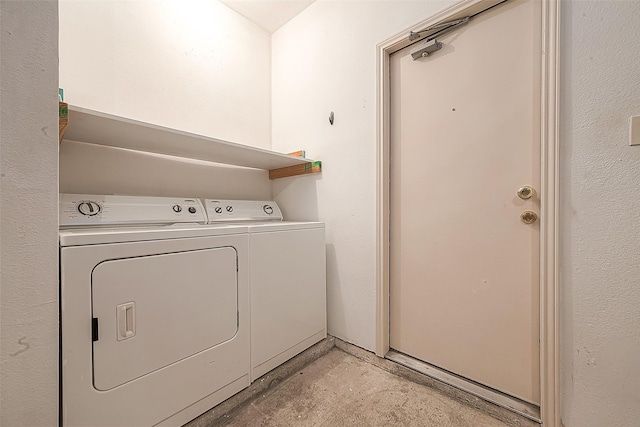 washroom featuring washing machine and dryer