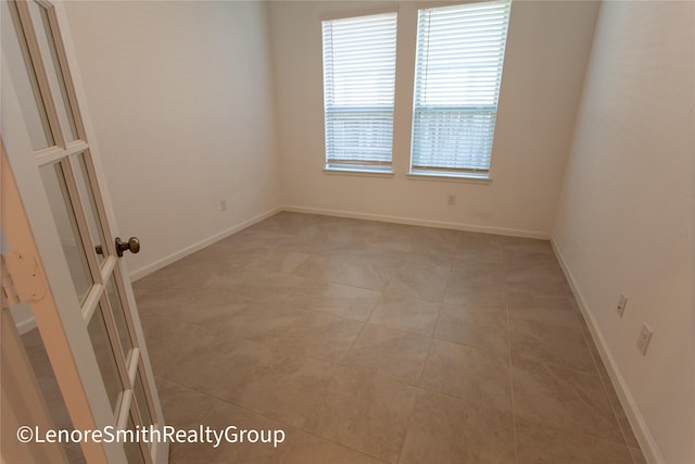 view of tiled spare room