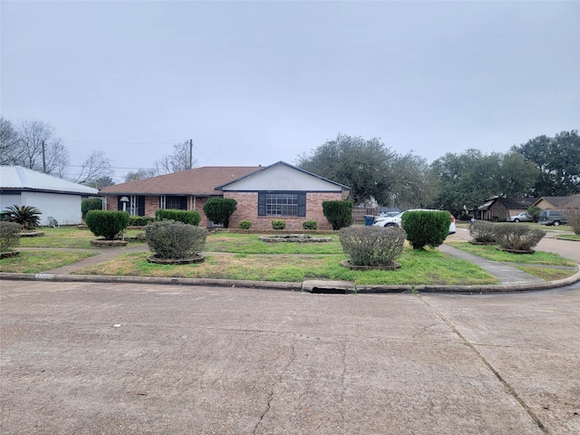 view of side of property featuring a yard