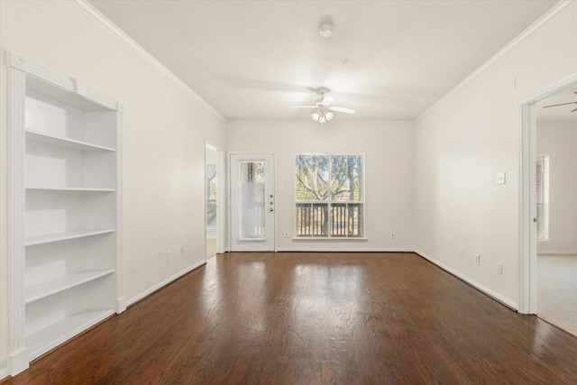 empty room featuring ceiling fan, dark wood-type flooring, and ornamental molding