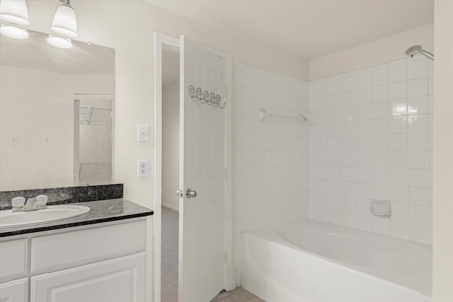 bathroom featuring vanity and shower / bath combination