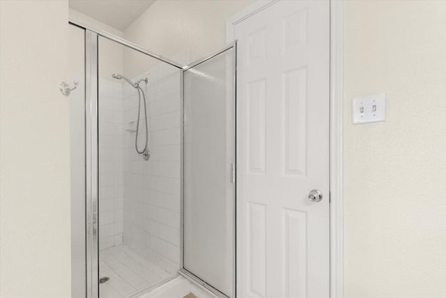 bathroom featuring walk in shower