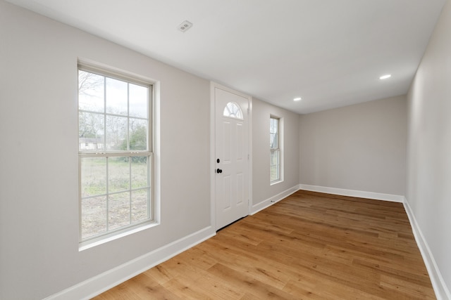 foyer entrance featuring light hardwood / wood-style floors