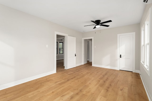 unfurnished bedroom with ceiling fan and light hardwood / wood-style floors