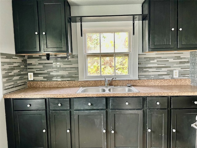 kitchen with decorative backsplash and sink