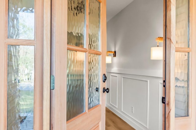 doorway to outside with hardwood / wood-style floors