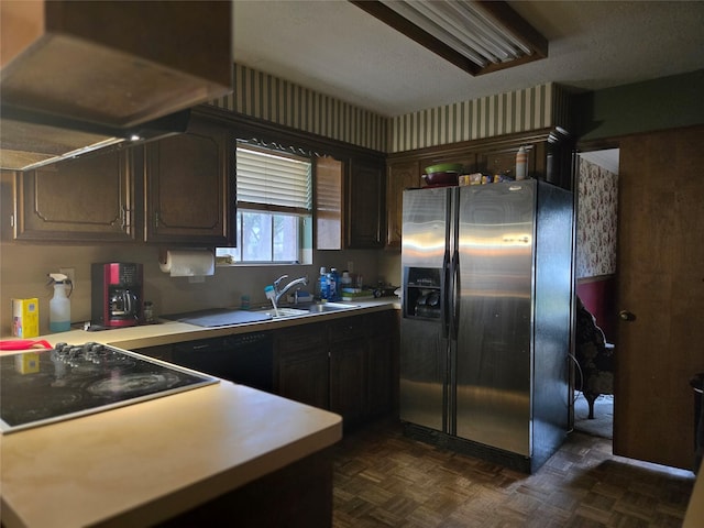 kitchen featuring stainless steel refrigerator with ice dispenser, exhaust hood, dark brown cabinets, and dark parquet flooring