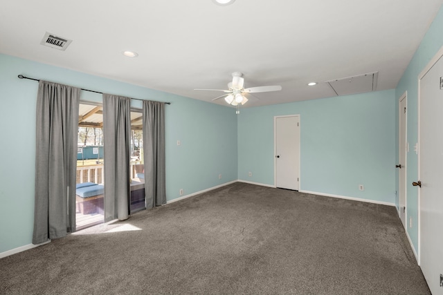 carpeted spare room with ceiling fan