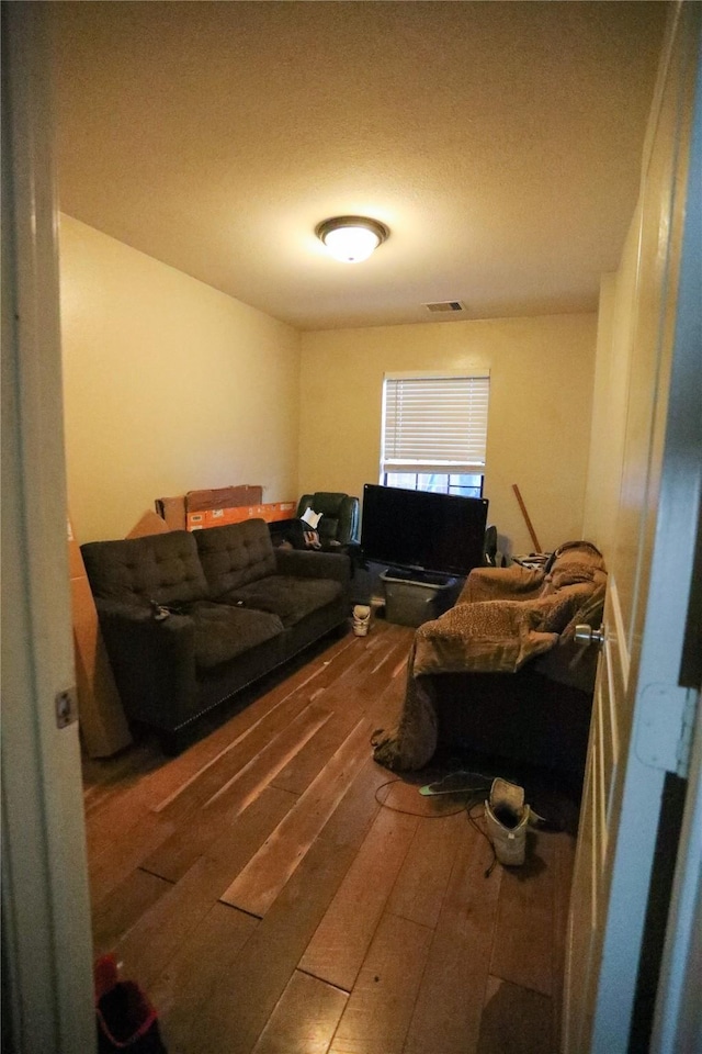 living room with wood-type flooring