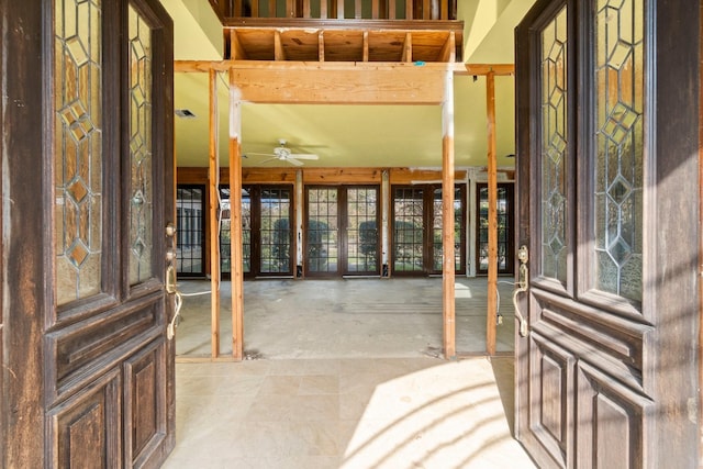 entryway featuring ceiling fan and plenty of natural light