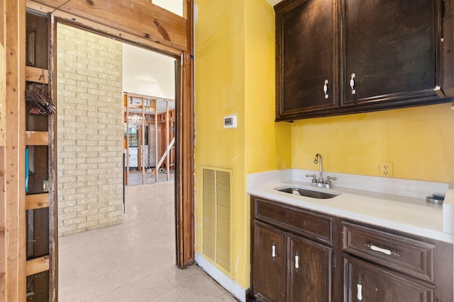 bathroom featuring tile patterned flooring and vanity