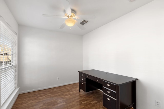 office space featuring ceiling fan and dark wood-type flooring