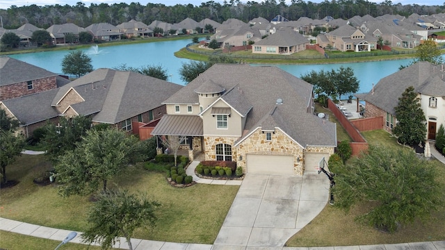 drone / aerial view featuring a water view