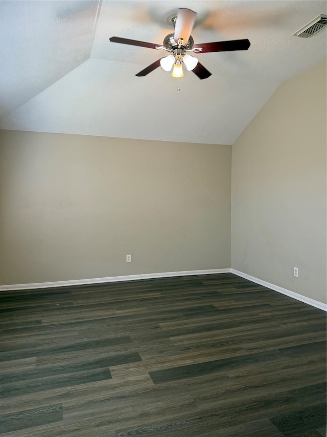 bonus room featuring dark hardwood / wood-style flooring, vaulted ceiling, and ceiling fan