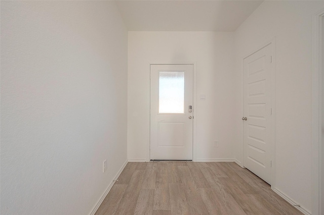 doorway featuring light wood-type flooring