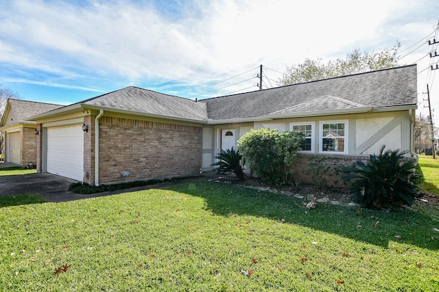 single story home with a front yard and a garage