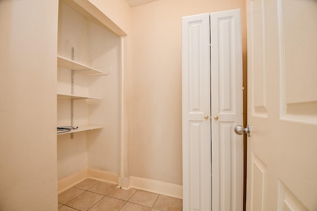 interior space featuring tile patterned flooring