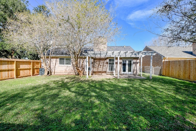 rear view of property with a lawn, a pergola, and a patio