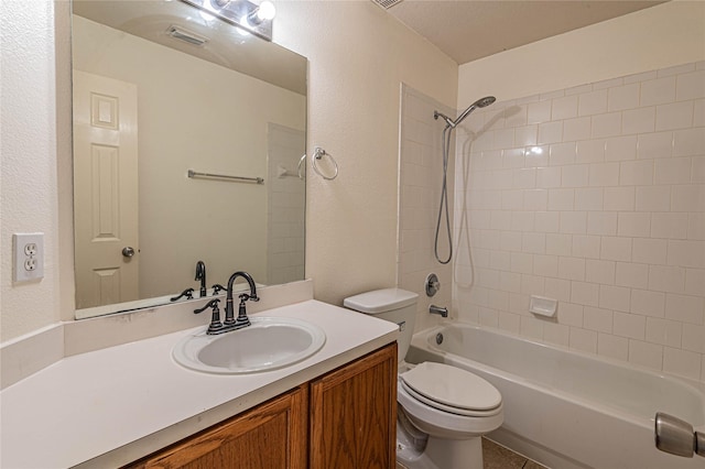 full bathroom featuring tile patterned floors, vanity, shower / bathtub combination, and toilet