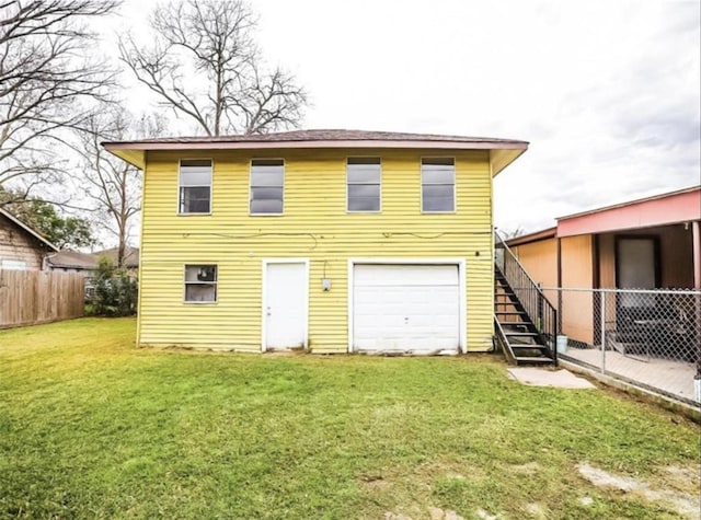 back of house with a yard