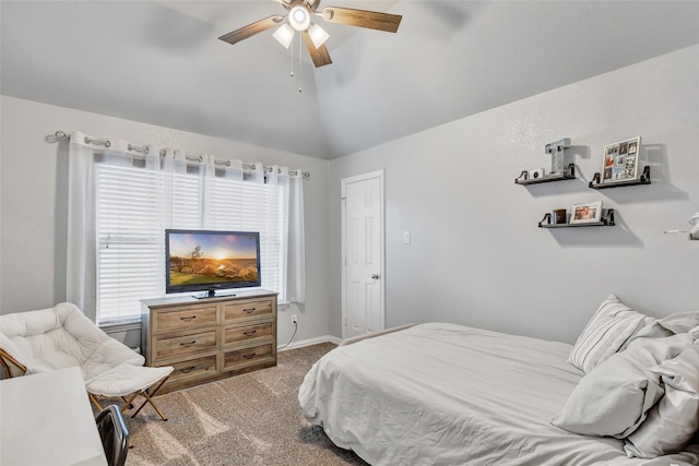 carpeted bedroom featuring multiple windows, ceiling fan, and high vaulted ceiling