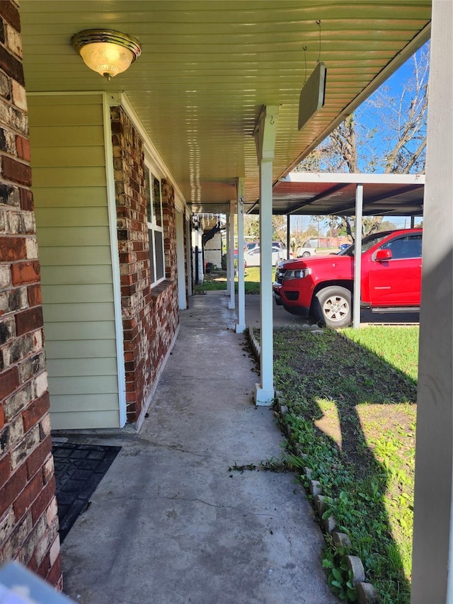 view of patio / terrace with a carport